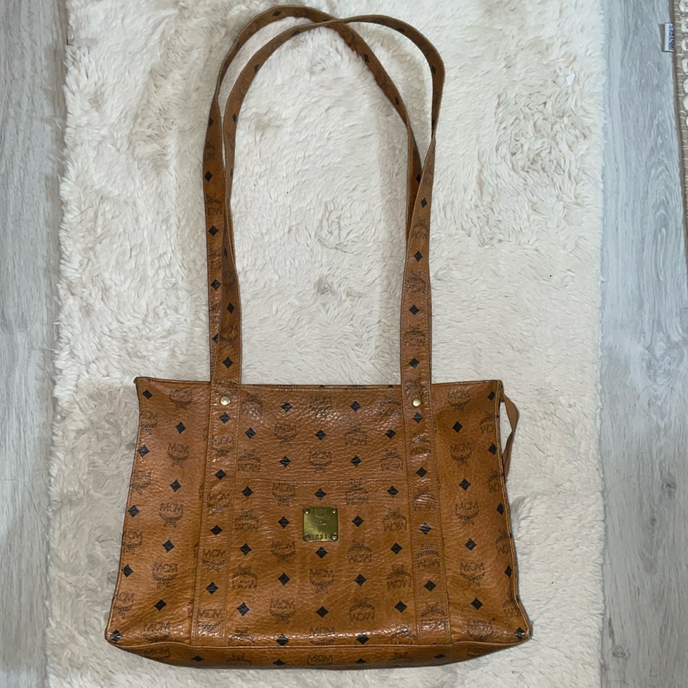 Authentic MCM shoulder bag preowned. Tan color